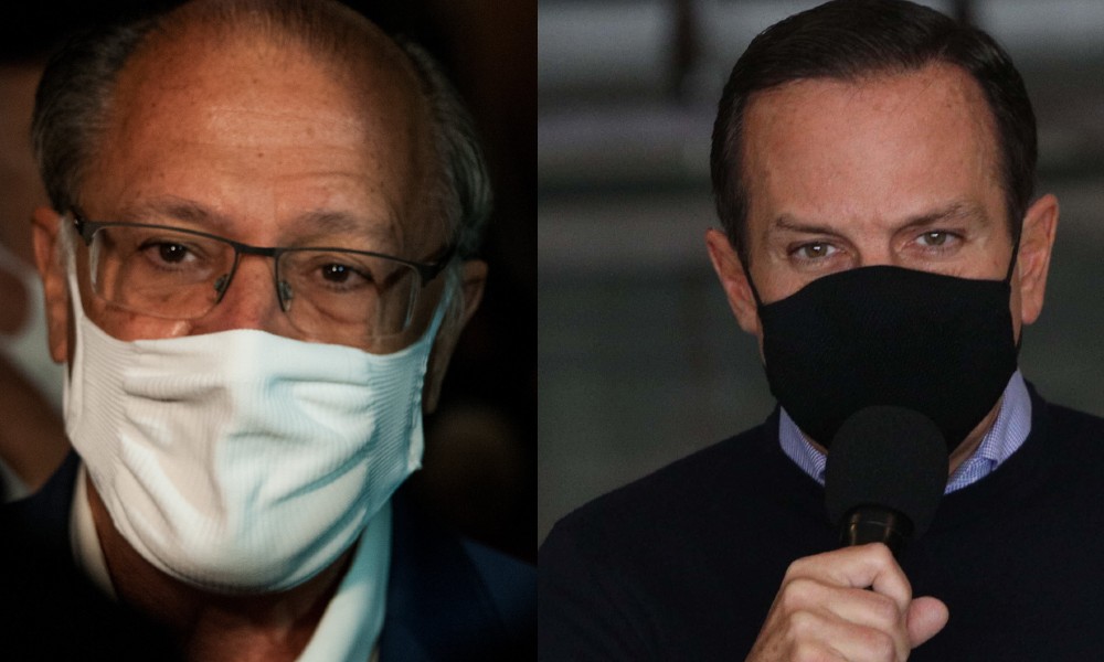 Rosto de Alckmin e de Doria, ambos de máscara