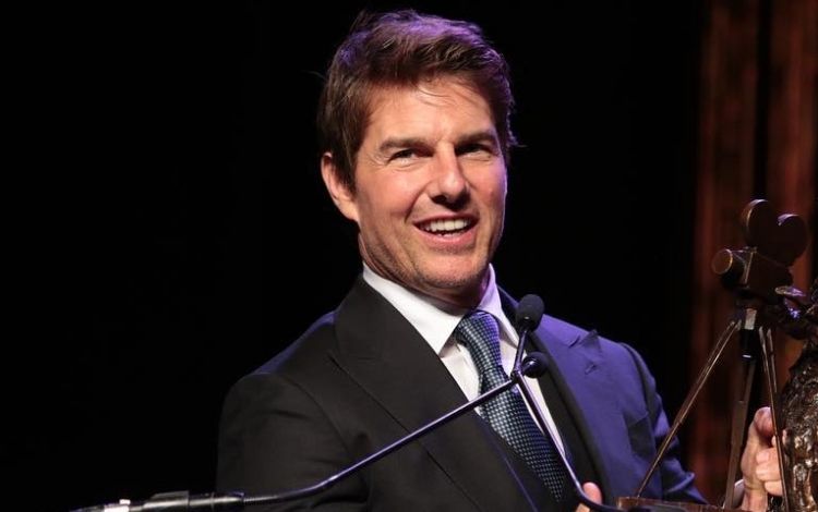 Tom Cruise sorrindo