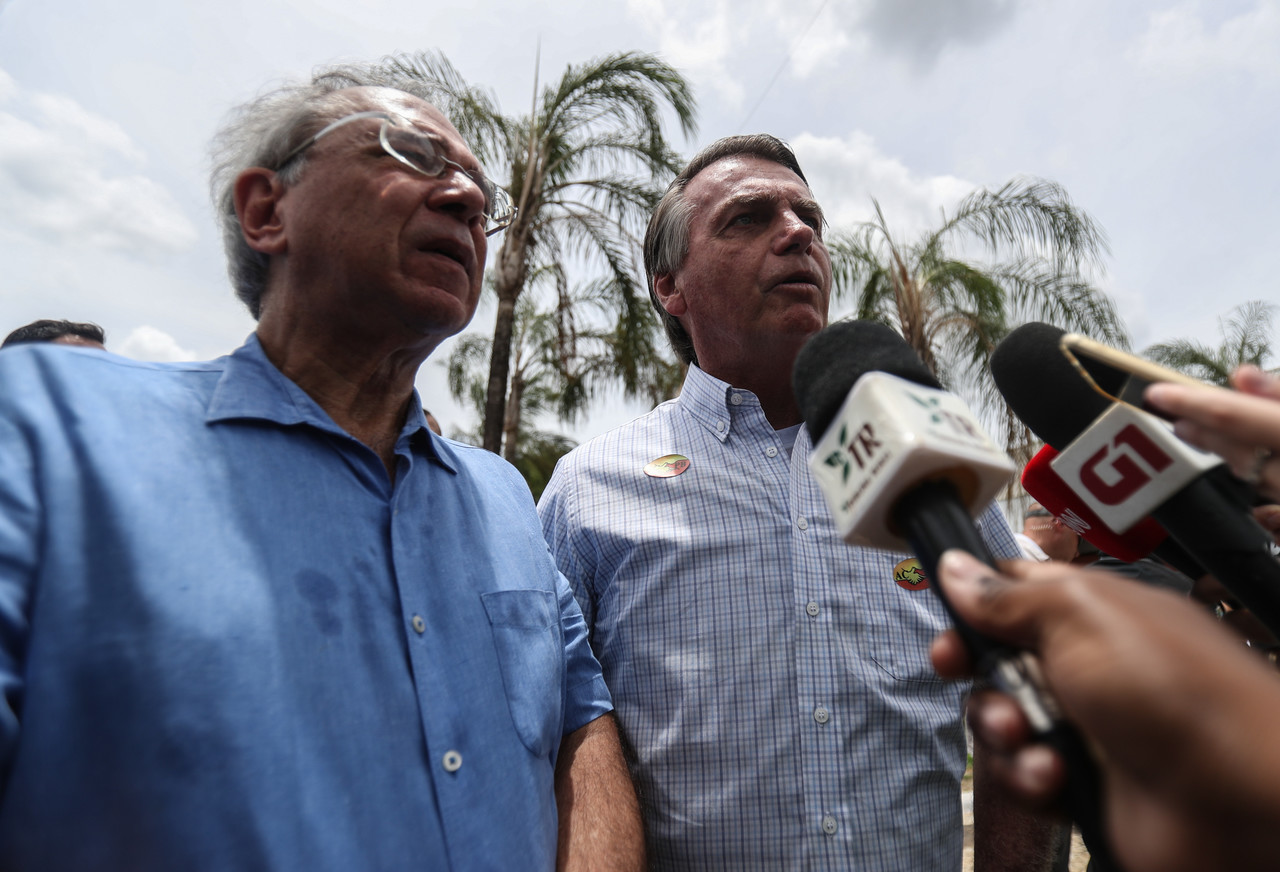Ministro da Economia, Paulo Guedes, ao lado do presidente, Jair Bolsonaro