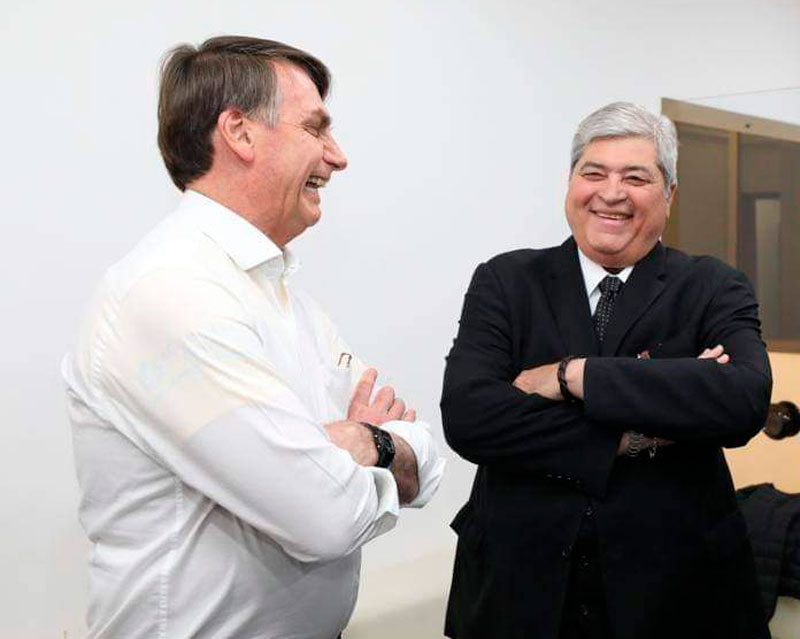 Jair Bolsonaro e Datena dando risada
