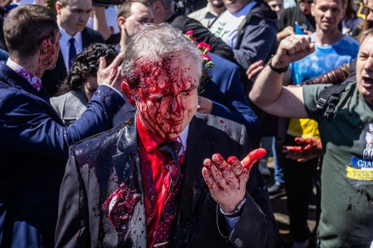 russian ambassador smeared with red ink
