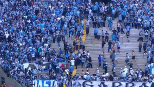 Imagem da confusão entre torcedores de Grêmio e Cruzeiro