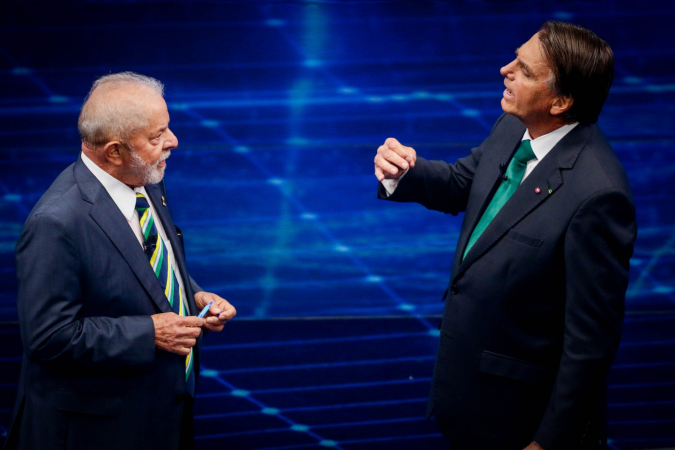 Lula e Jair Bolsonaro durante debate