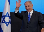 o ex-primeiro-ministro de Israel e líder do partido Likud, Benjamin Netanyahu, se dirige a apoiadores na sede da campanha em Jerusalém logo após o fim da votação para as eleições nacionais.