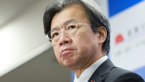 ministro-reconstrução-japão-STR-JIJI Press-AFP