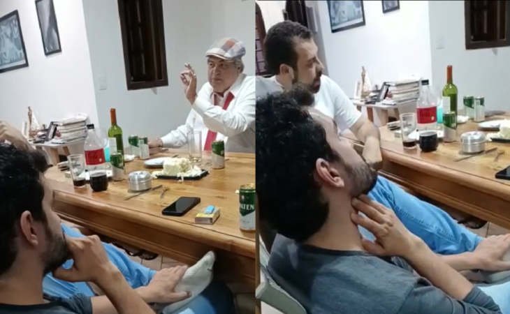 Guilherme Boulos e Datena sentados em uma mesa