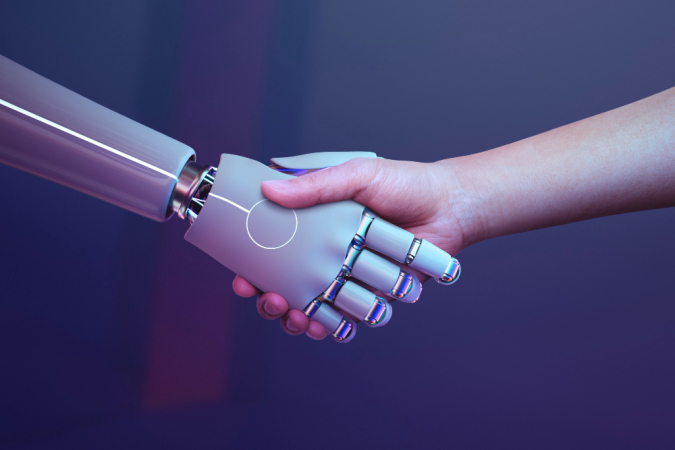 Mão robótica aperta mão humana
