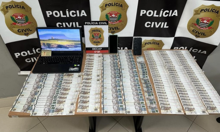 Notas falsas e um notebook apreendidos pela Polícia Civil