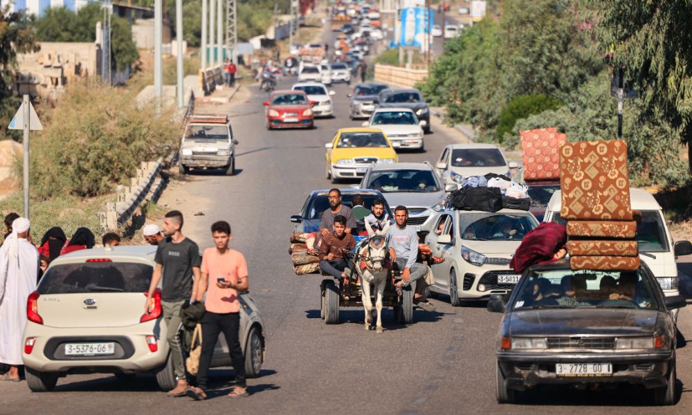 refugiados-palestinos-fogem-da-faixa-de-gaza-MAHMUD HAMS-AFP