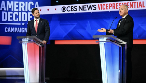 US Senator and Republican vice presidential candidate J.D. Vance (L) and Minnesota Governor and Democratic vice presidential candidate Tim Walz participate in the Vice Presidential debate hosted by CBS News at the CBS Broadcast Center in New York City on October 1, 2024. (Photo by ANGELA WEISS / AFP)