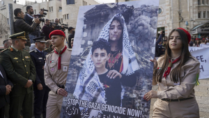 Palestinos celebram o Natal em Belém, cidade da Cisjordânia ocupada onde a tradição situa o nascimento de Jesus