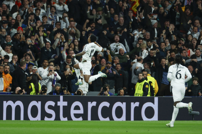 O atacante brasileiro do Real Madrid, Rodrygo, após marcar o primeiro gol da equipe madridista durante o jogo de ida das oitavas de final da Liga dos Campeões