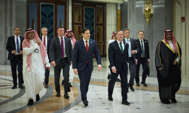 This handout photograph taken and released by Ukrainian Presidential Press Service in Jeddah on March 11, 2025, shows US Secretary of State Marco Rubio (C-L) and US National Security Advisor Michael Waltz (C-R) walking before the Ukrainian and US delegations meeting, amid the Russian invasion of Ukraine.