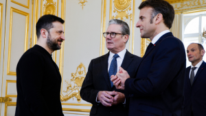 Ukraine's President Volodymyr Zelensky, France's President Emmanuel Macron and Britain's Prime Minister Keir Starmer speak during a trilateral meeting on the sidelines of a summit for "coalition of the willing" at the Elysee Palace, on March 27, 2025. French President Emmanuel Macron on March 27, 2025 is to host European leaders including President Volodymyr Zelensky for a summit aimed at boosting Ukrainian security ahead of any potential ceasefire with Russia.