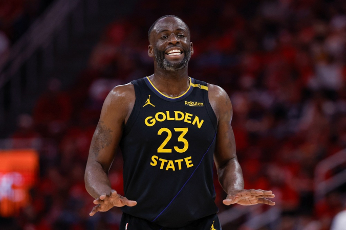 Draymond Green (#23), do Golden State Warriors, reage durante o segundo tempo contra o Houston Rockets