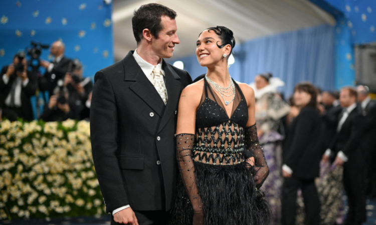 British-Albanian singer-songwriter Dua Lipa (R) and British actor Callum Turner arrive for the 2025 Met Gala at the Metropolitan Museum of Art on May 5, 2025, in New York. The Gala raises money for the Metropolitan Museum of Art's Costume Institute. The 2025 Met Gala is themed "Tailored for You," aligning with the Costume Institute’s exhibition, "Superfine: Tailoring Black Style," set to open to the public on May 10. (Photo by ANGELA WEISS / AFP)