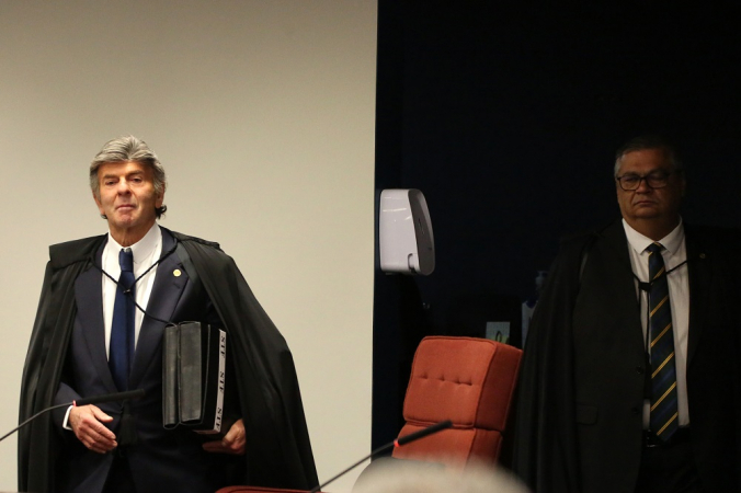 Luiz Fux e Flávio Dino (d), ministros do Supremo Tribunal Federal, durante julgamento contra o ex- presidente Jair Bolsonaro (PL) e mais sete réus