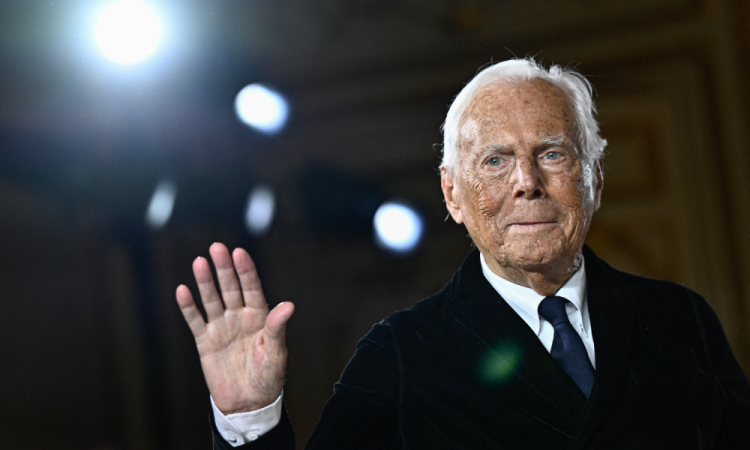 Italian designer Giorgio Armani thanks the applause at the end of his presentation to Armani Prive during the Spring/Summer 2025 Women's Fashion Week, in celebration of his 20th anniversary in Paris, on January 28, 2025. The great name of Italian fashion Giorgio Armani died at 91