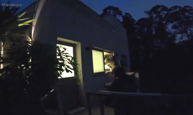 The agents were recorded entering through one of the windows of the house.